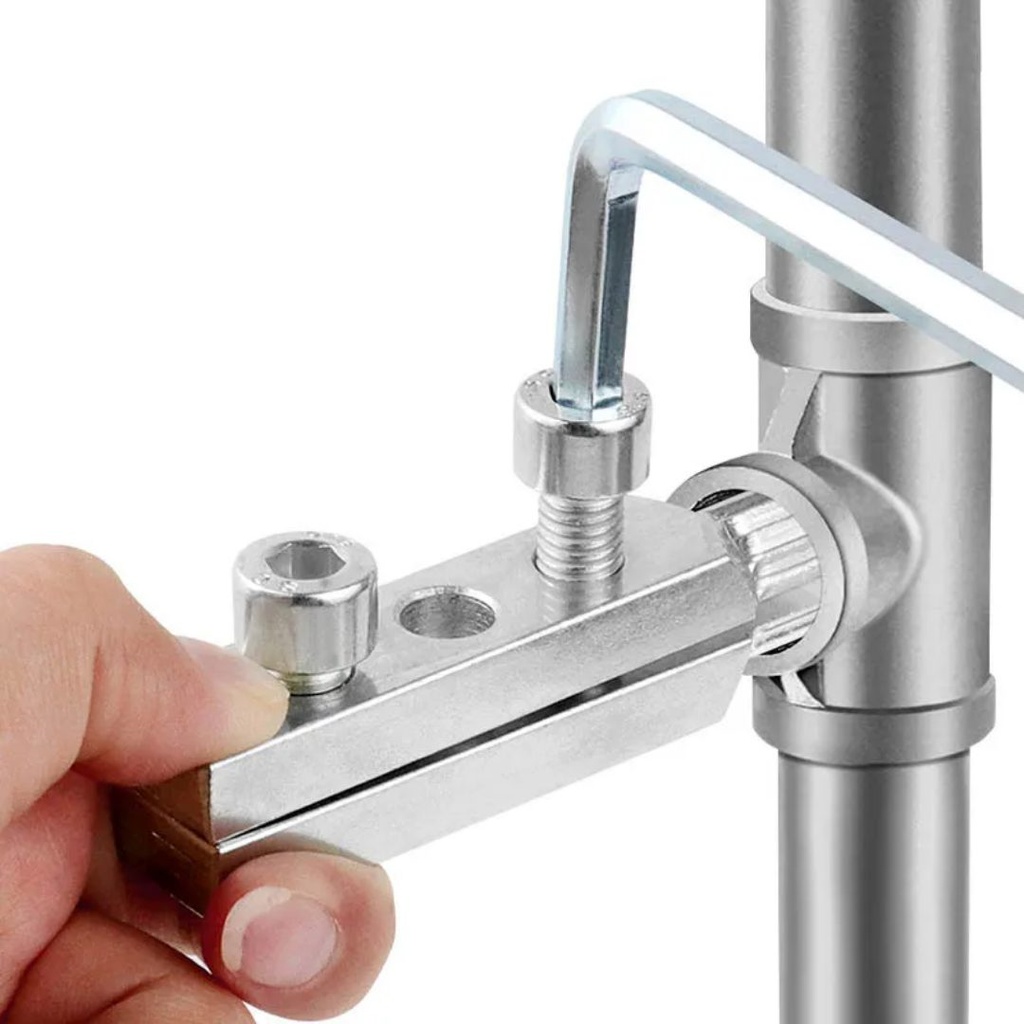 Extracteur de fil cassé à valve triangulaire